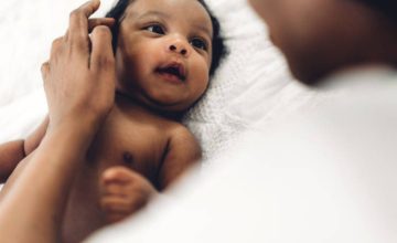 Mother and infant looking at each other