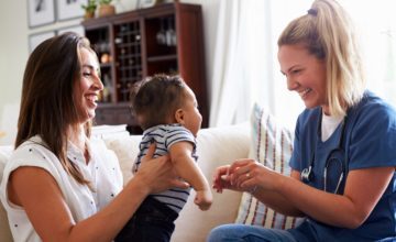 Home Visiting Nurse with infant and family